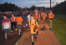 Landyn Toney leads the group of walkers who were joining him at the start of his Journey of Awareness, from Redcliff Middle School in Valley, Colchester County. In six-day, the 11-year-old Mi’kmaw boy will cover 157 kilometres to his home of Annapolis Valley First Nation.