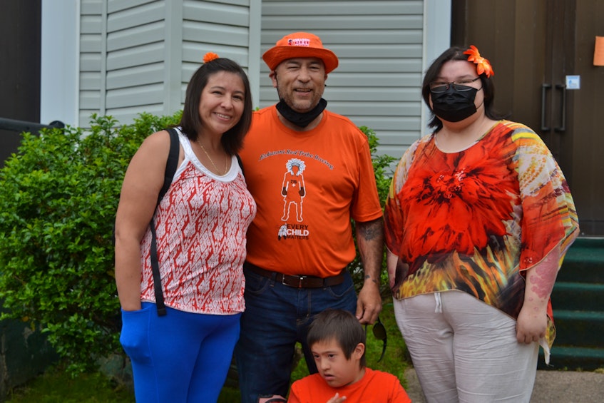 Albert Marshall Jr., centre, the son of a residential school survivor, was proud to have his family, Andrea, Albert (Tommy), and Abigail take part in the walk, which he said represents the fact that his people are still here today. ARDELLE REYNOLDS/CAPE BRETON POST