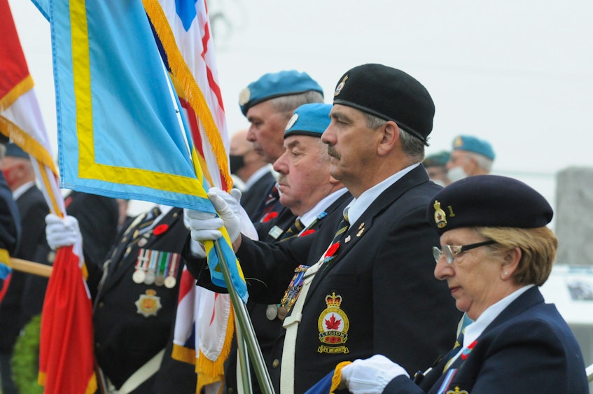 Royal Canadian Legion, Branch 1, colour party members (from left) Jim King, Ed Burke, John Grenning and Patricia Harding at the ceremony at the Field of Honour. — Joe Gibbons/The Telegram
