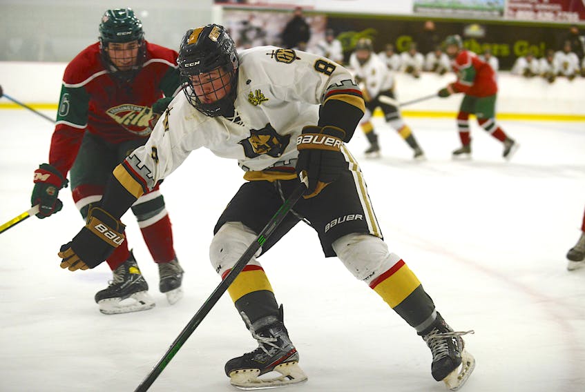 Charlottetown Bulk Carriers Knights forward Jude Campbell, right, protects the puck during a game against the Kensington Monaghan Farms Wild during the 2020-21 season at MacLauchlan Arena in Charlottetown. The Summerside D. Alex MacDonald Ford Western Capitals selected Campbell with their first pick, 24th overall, in the Maritime Junior Hockey League Entry Draft on July 10.