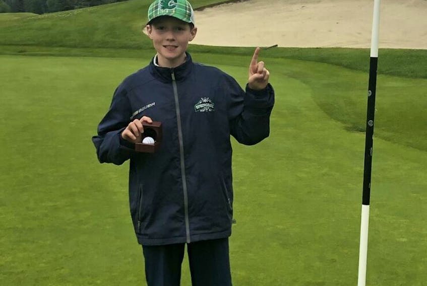 Joshua Saunders, 12, already has an ace to his credit after a sweet shot on No. 3 on the Slopes Nine at Glencoe Golf &amp; Country Club. 