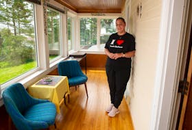 TJ Gaudaur, a single mom of three kids who works at Souls Harbour's thrift store, poses for a photo at the charity's new women's and children's shelter on the Eastern Shore on Monday, July 12, 2021.