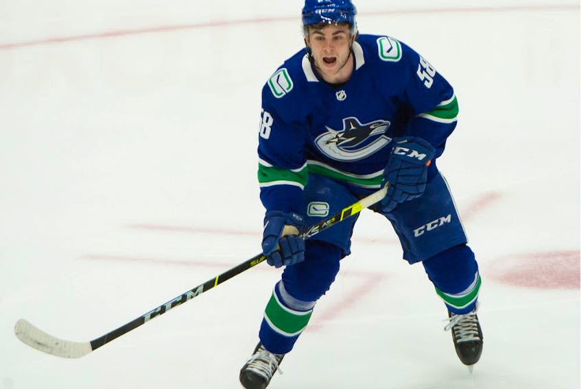 Vancouver Canucks winger Will Lockwood plays against the Calgary Flames on May 18, 2021 at Rogers Arena.