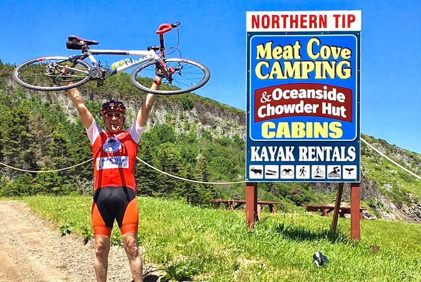   Simon Pont celebrates at the conclusion of his 1,000 bike ride from Nova Scotia’s most southern tip on Cape Sable Island to the most northern point at Meat Cove in Cape Breton to raise awareness and funds in support of prostate cancer research. Contributed
