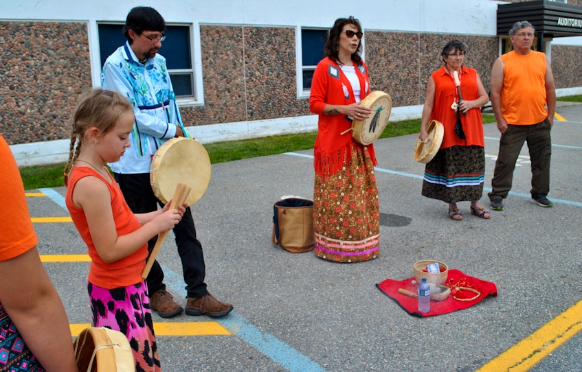 Melanie Robinson-Purdy (centre) shares some reflections about the residential school system with participants at the Every Child Matters walk in Shelburne on July 10. KATHY JOHNSON - Kathy Johnson