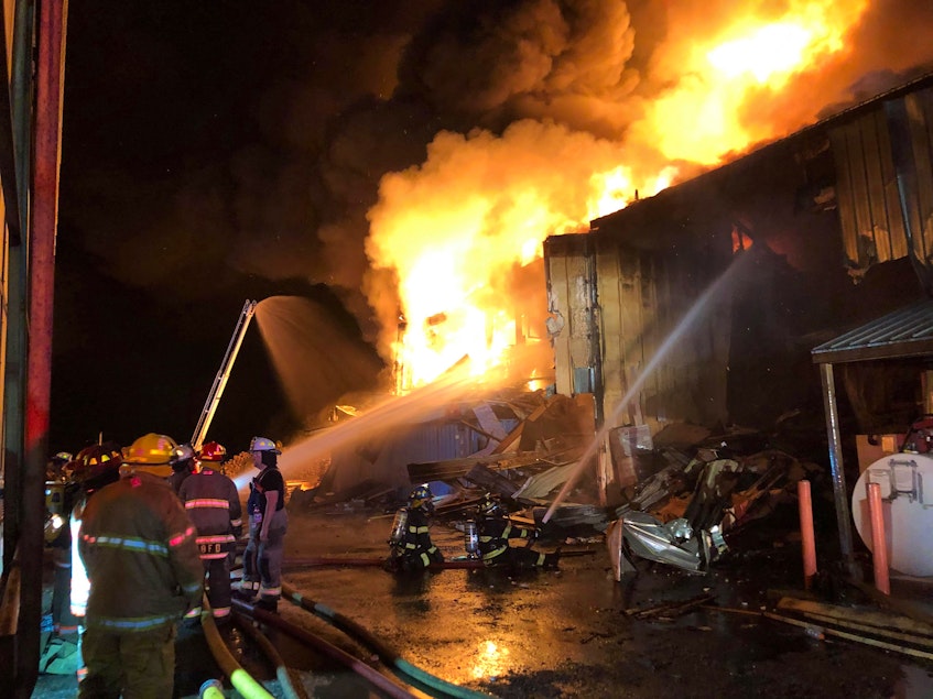 Firefighters from numerous departments were on the scene of a fire that broke out on July 13 at the Lewis Mouldings plant in Weymouth, Digby County. - Contributed