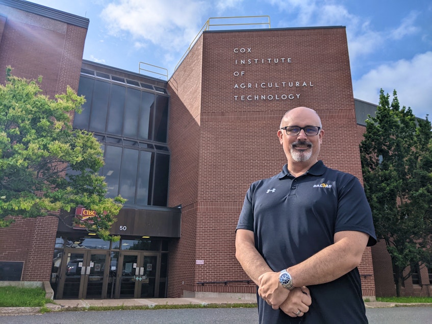 Dean David Gray stands in front of the Cox Institute at the Dalhousie University Agricultural Campus. Although its exterior looks unchanged, the east wing inside is entirely new. - Chelsey Gould