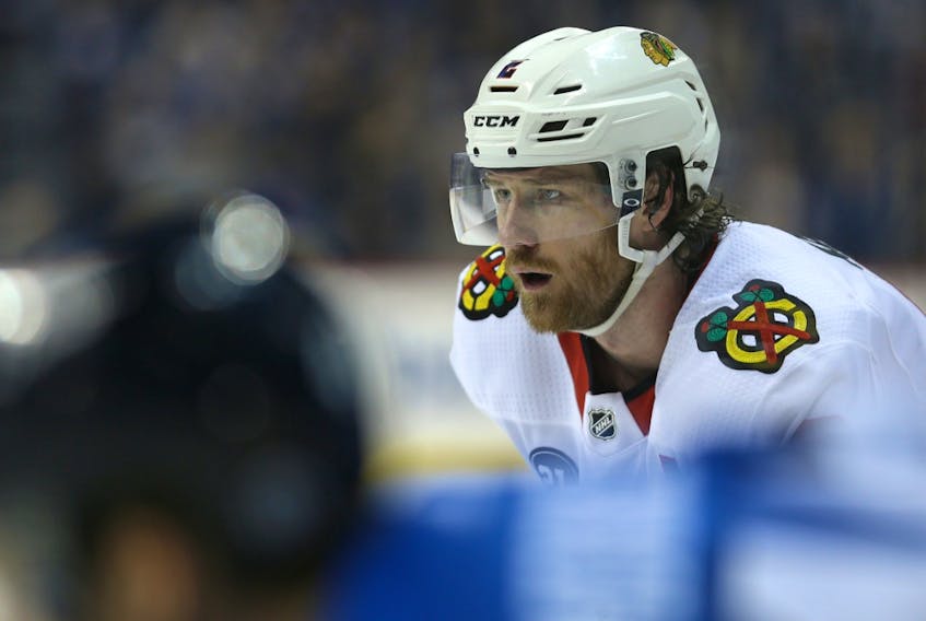 Chicago Blackhawks defenceman Duncan Keith lines up for a faceoff against the Winnipeg Jets in Winnipeg on Dec. 11, 2018.