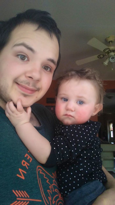 Ryan Durling of Margaretsville holds his niece Nora in 2017. Durling died in the spring of 2018 at the age of 21 in a workplace accident on an EFR Environmental garbage truck in Port Williams. - Contributed