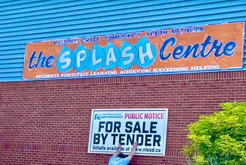 The public sale tender sign went up Wednesday on the Splash Centre in Harbour Grace. The building that houses the centre is set to be sold in the fall. 