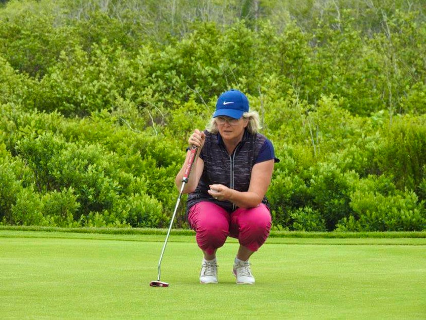 Shelburne County golfer Karla Wilms eyes up a putt at the 2021 Nova Scotia Golf Association (NSGA) Women’s Senior Championship at the Clare Golf and Country Club on July 4. Wilms won the senior women’s championship in a three hole play-off. Contributed

 - Contributed