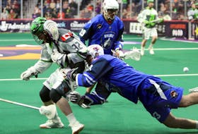 Halifax Thunderbirds’ Brandon Robinson checks Saskatchewan Rush’s Matthew Dinsdale during a National Lacrosse League game on Feb. 15, 2020 at the Scotiabank Centre. - Eric Wynne / The Chronicle Herald