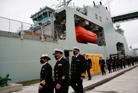 FOR COOKE STORY:
Crew members of HMCS Margaret Brooke, prepare to board the ship after it was given over, at a ceremony at HMC Dockyard Thursday July 15, 2021. SEE COOKE STORY