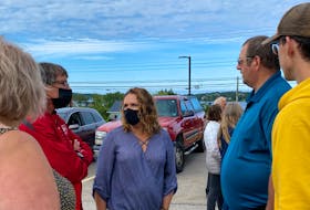 Municipality of Yarmouth councillor Sheri Hurlburt speaks with some of the protesters outside the Yarmouth Municipal Building.
CARLA ALLEN • TRICOUNTY VANGUARD