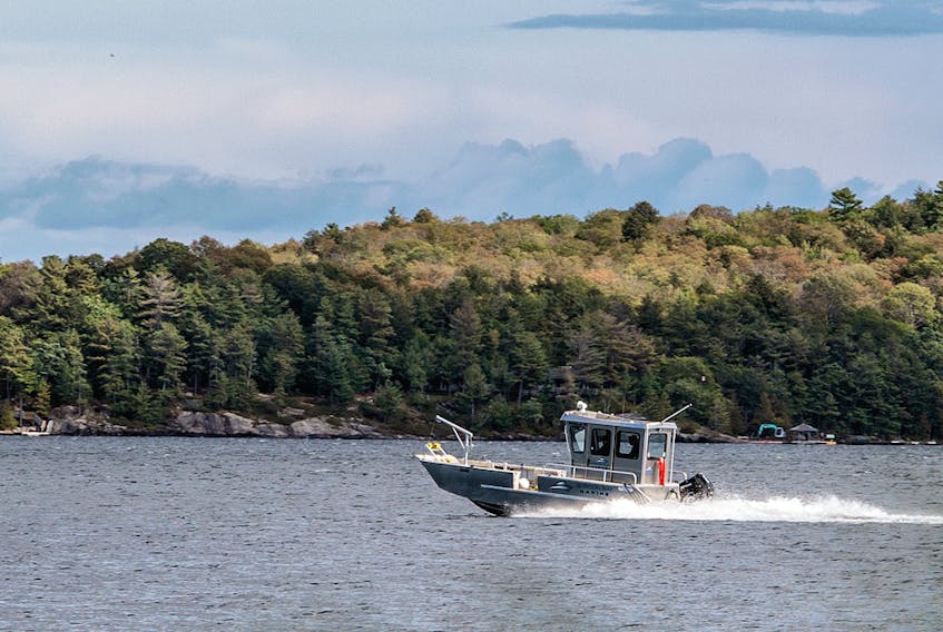 A boat drives across Lake Joseph, photographed September 26, 2019, near where a collision involving Linda and Kevin O'Leary occurred.
