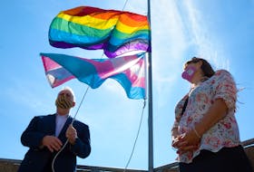 St. John’s mayor Danny Breen raises the Pride flag at St. John’s city hall Friday morning at the start of Pride Week 2021 festivities. At right is deputy mayor Sheilagh O’Leary.

Keith Gosse/The Telegram