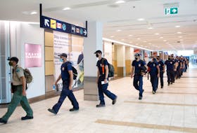 FOR NOIUSHIN STORY:
A group of Nova Scotian firefighters, make their way towards the departure area, as two groups head towards Manitoba and Ontario to fight wildfires, at Halifax Stanfield Int'l Airport Friday July 16, 2021.

TIM KROCHAK PHOTO