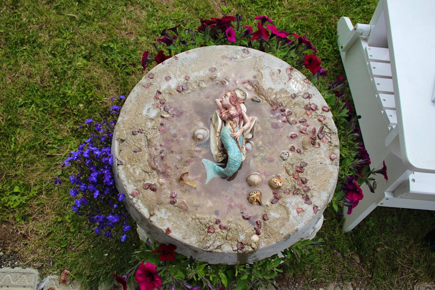 A mermaid flower planter Kernaghan made for her garden. - Colin MacLean