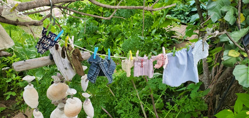 Part of creating a fairy garden is making a space look lived-in. Kernaghan has added several elements, like this mini clothesline, to her garden. - Colin MacLean