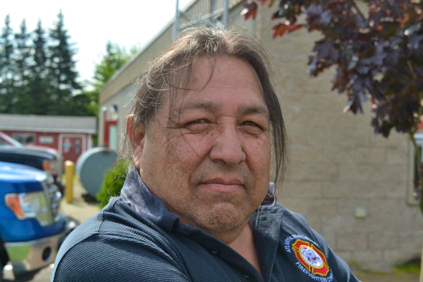 John 'Tiny' Cremo is the fire chief for the volunteer fire department in We'koqma'q First Nation. He hopes to fundraise to replace his department's 40-year-old equipment  with the more modern gear North Sydney's station has. ARDELLE REYNOLDS