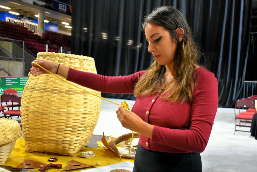 Destiny Myers weaves a medicine pouch, a sacred Indigenous item that usually contains the four medicines; tobacco, sweetgrass, sage, and cedar. “These pouches can include other special items belonging to the owner, and they are extremely sacred, providing spiritual protection,” she says