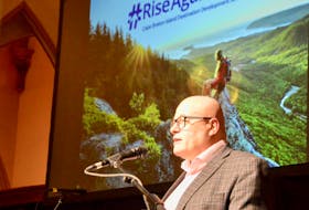 Destination Cape Breton Association chief executive officer Terry Smith unveils the organization’s new destination development strategy to a group of tourism operators and industry insiders on Wednesday in Sydney. DAVID JALA/CAPE BRETON POST