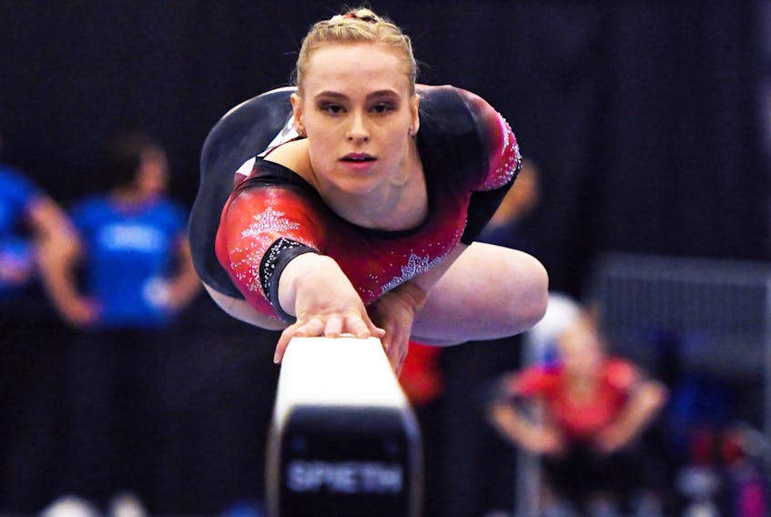 Canadian gymnast Ellie Black on the balance beam at an international competition. - Dan Galbraith/Gymnastics Canada
