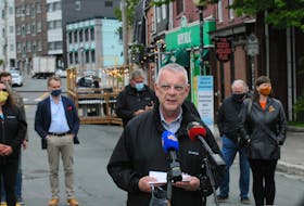 St. John’s Mayor Danny Breen speaks to reporters Friday at the reopening of the downtown pedestrian mall. Joe Gibbons • The Telegram