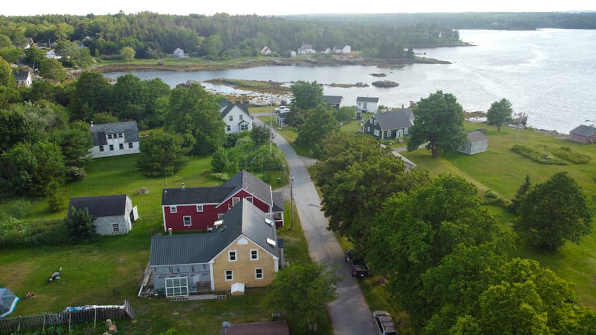 A bird's eye view of the formerly abandoned home across the road from the Medway River. - Eric Wynne