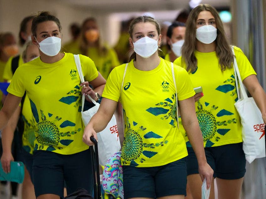 Members of Australian team walk to take the COVID antigen test at Narita airport in Tokyo. - Postmedia  photo