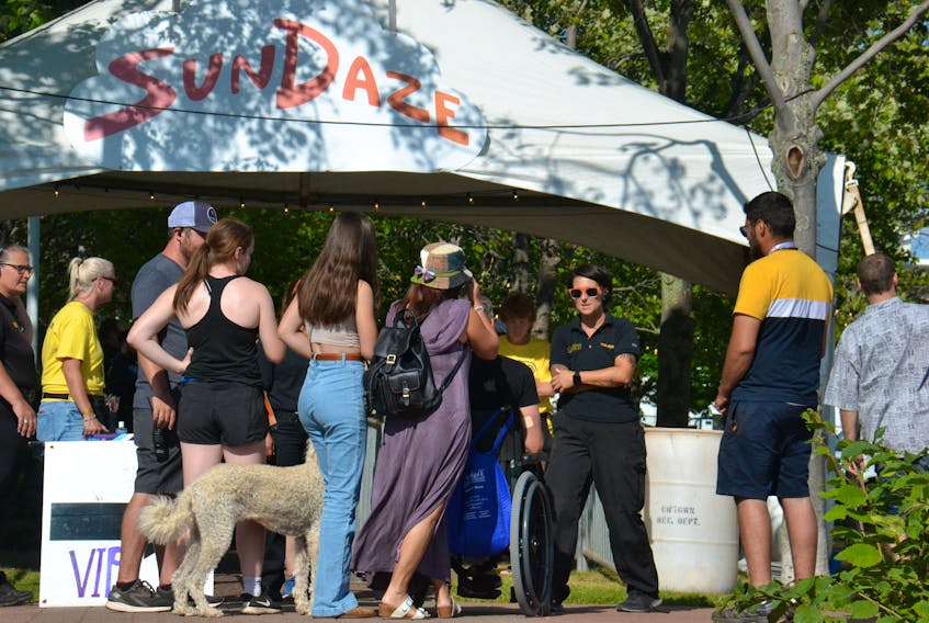 In a pre-COVID-19 photo, people stand in line to attend the SunDaze Music & Art Festival before the first performance at Confederation Landing in Charlottetown on Aug. 23, 2019. The provincial government is offering funding to cover some pandemic-related costs for festivals and events held this year.