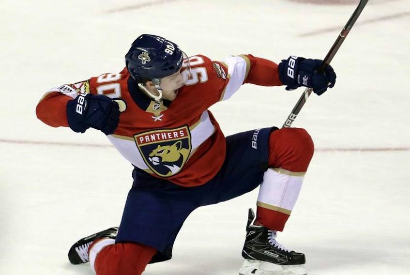 Florida Panthers' Jared McCann celebrates after scoring the winning goal during the third period of an NHL hockey game against the Boston Bruins, Thursday, April 5, 2018, in Sunrise, Fla.