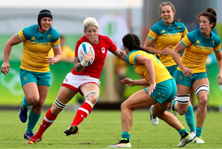  Jennifer Kish of Canada gets tackled during the Women’s Semi Final 1 Rugby Sevens match between Australia and Canada on Day 3 of the Rio 2016 Olympic Games at the Deodoro Stadium on August 8, 2016 in Rio de Janeiro, Brazil.