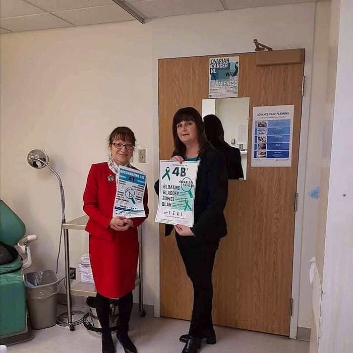 Oncologist Dr. Cathy Popadiuk (left) and Susan Glynn pose last year with the poster they designed raising awareness of ovarian cancer symptoms. — SaltWire Network file photo