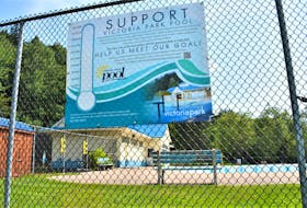 A large sign hangs on the Victoria Park Pool fence, outlining the campaign to help raise funds for the necessary work.