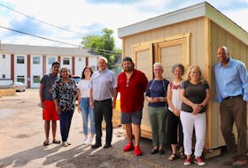 Committee members stand in front of the new P.E.I. Community Fridge in Charlottetown. From left: Samel Sunil, Sandra Sunil, Maria MacLeod, Trevor MacKinnon, John Pritchard, Barb McDowell, Jill Olscamp, Bethany Morrison and Gord McNeily. Not pictured are Sheena Mathew, Ole Hammarlund, Liv Lee and Stephanie O'Regan Rainie, who are also on the committee.