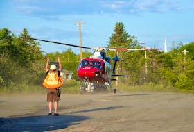 Brooklyn firefighters helped the Life Flight air ambulance crew land and take-off from the Trunk 1 weigh scales in rural Hants County.
ADRIAN JOHNSTONE
