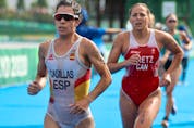 Miriam Casillas Garcia of Team Spain and Amelie Kretz of Team Canada compete during the individual triathlon on Day 4 of the Tokyo 2020 Olympic Games at Odaiba Marine Park on July 27, 2021 in Tokyo, Japan.