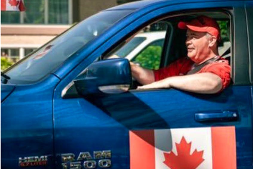 Alberta Premier Jason Kenney changed his Twitter profile picture to show him at the wheel of his Dodge Ram 1500 after firing back at a Globe and Mail opinion piece calling pickups a plague on the roads of the nation. 

