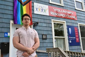 Connor Kelly, tenant network coordinator with P.E.I. Fight for Affordable Housing, stands outside the Voluntary Resource Centre in Charlottetown.