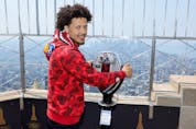 Potential top NBA draft pick Cade Cunningham visits The Empire State Building on Tuesday.