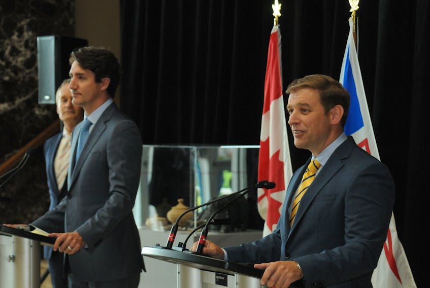 Speaking in St. John's Wednesday, with Natural Resources Minister Seamus O'Regan looking on, Prime Minister Justin Trudeau and Newfoundland and Labrador Premier Andrew Furey announced power rate mitigation deal that would prevent power rates in that province doubling once the controversial Muskrat Falls hydroelectric project comes on line.  
 -Joe Gibbons/ SaltWire

