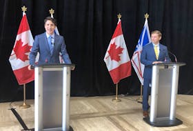 Prime Minister Justin Trudeau (left) announced a power rate mitigation deal alongside Newfoundland and Labrador Premier Andrew Furey, July 28, 2021 at the Confederation Building in St. John's.