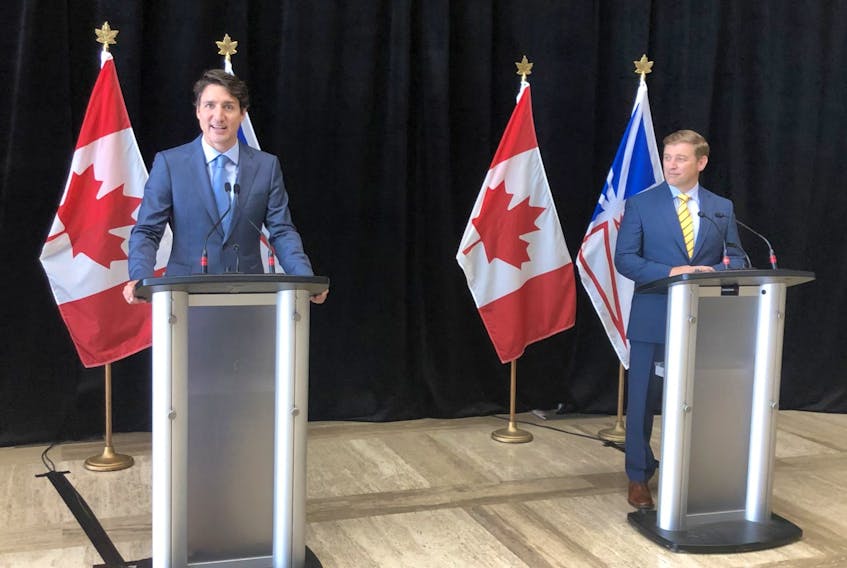 Prime Minister Justin Trudeau (left) announced a power rate mitigation deal alongside Newfoundland and Labrador Premier Andrew Furey, July 28, 2021 at the Confederation Building in St. John's.