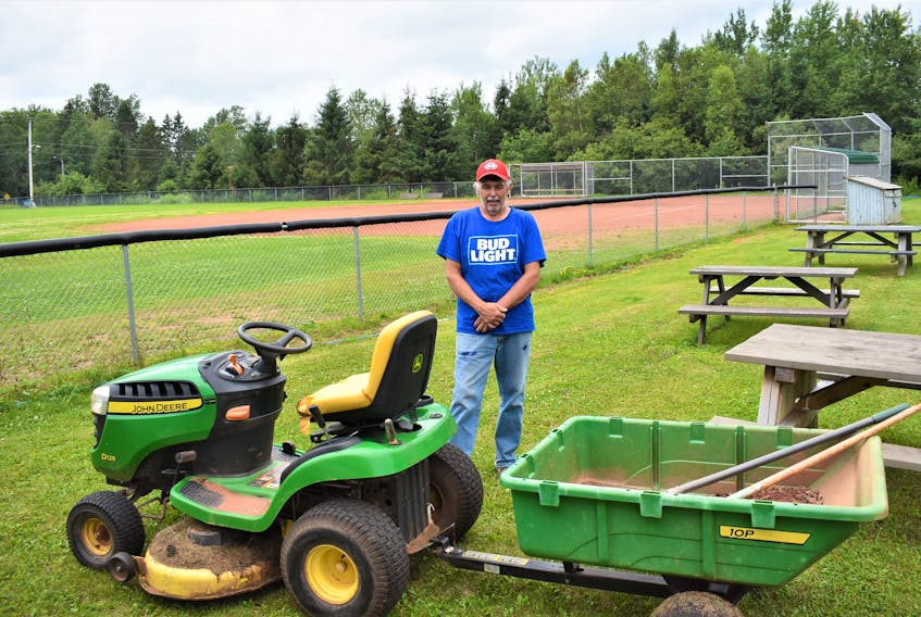Bible Hill native Darren ‘Boo’ Crowell with the equipment he used to bring the Pictou Road Ballfield back to being in good playing condition.