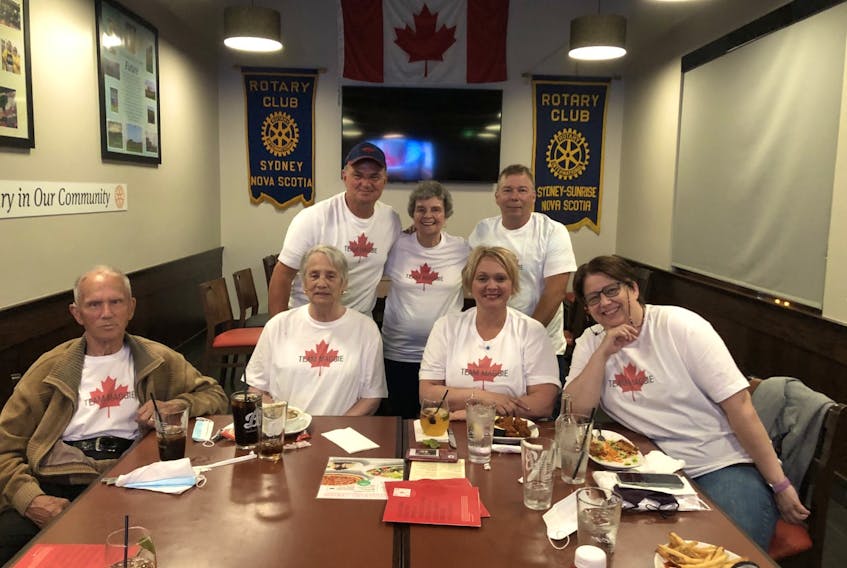 Maggie MacNeil’s family in Cape Breton gathered in Sydney on Sunday to watch the 21-year-old capture Canada’s first gold medal at the 2020 Tokyo Olympics. From left, front row, Eddie MacNeil (grandfather), Mary Dewan (great-aunt), Tracy MacNeil-Tighe (cousin) and Lesley Dewan (cousin); back row, Vince MacNeil (uncle), Patsy MacNeil (grandmother) and Raymond Duprey (cousin). MacNeil’s father Edward MacNeil is originally from New Waterford. CONTRIBUTED • VINCE MACNEIL