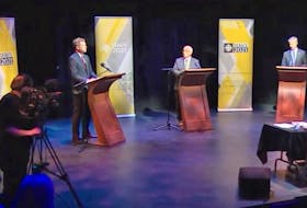 From left, Liberal Leader Iain Rankin, NDP Leader Gary Burrill and PC Leader Tim Houston take part in a debate Wednesday, July 28, 2021, hosted by the CBC at Neptune Theatre in Halifax.