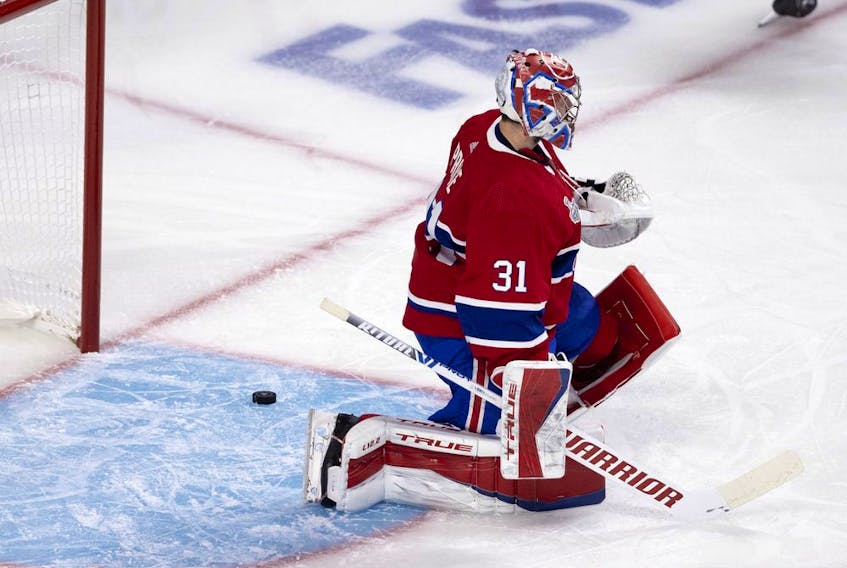 Canadiens goaltender Carey Price reacts to an early goal by Tampa Bay Lightning during Game 3 of the Stanley Cup Final in Montreal on Friday, July 2, 2021. 