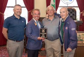 From left to right: program Coordinator Christopher Drummond, Mayor Philip Brown, Rick Callaghan, and Forbes Kennedy at the presentation of the 2021 Forbes Kennedy Volunteer of the Year Award.