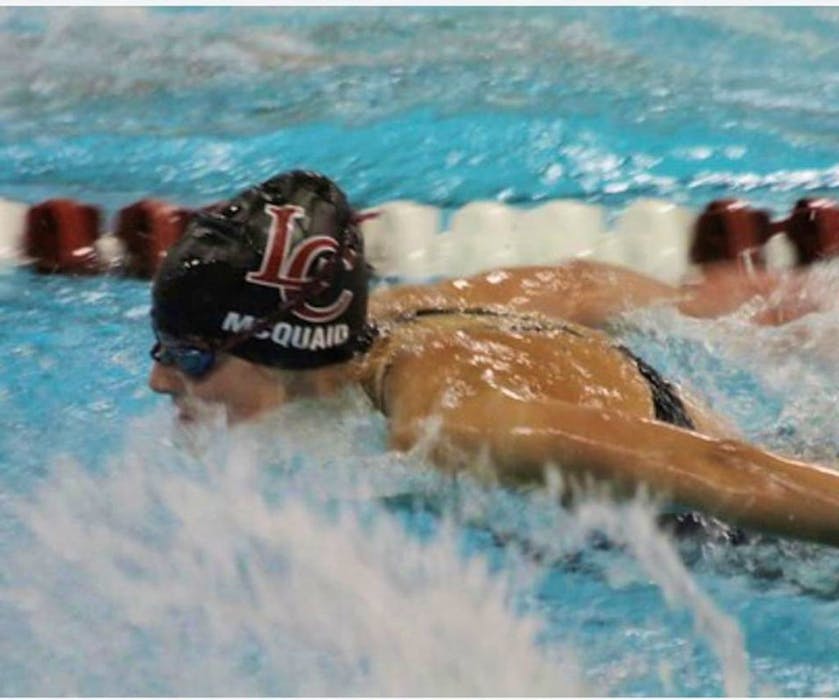 Alexa McQuaid competes in the pool for the Loomis Chaffee School swimming team. McQuaid set two pool records, four school records and a New England record during the 2020-21 season. Loomis Chaffe School is in Windsor, Conn.